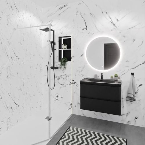 Salle de bain marbre blanc et noir avec meuble de salle de bain noir et miroir rond